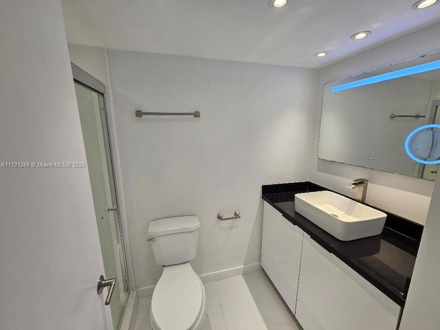 18051 Biscayne Blvd Unit 1704, Aventura, FL 33160 - bathroom featuring baseboards, toilet, recessed lighting, vanity, and tile patterned flooring