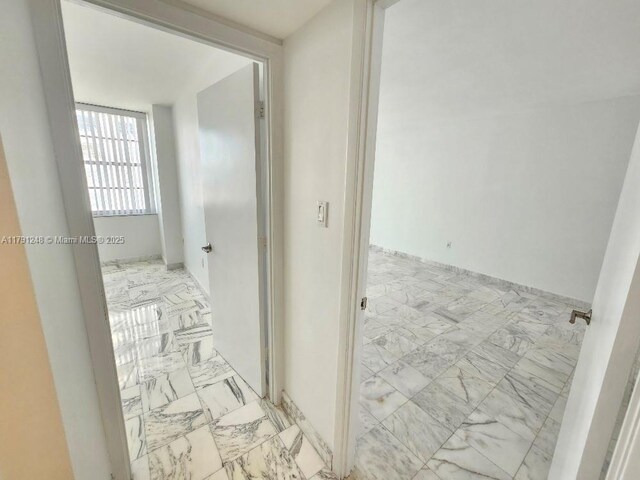 18051 Biscayne Blvd Unit 1704, Aventura, FL 33160 - hall featuring marble finish floor