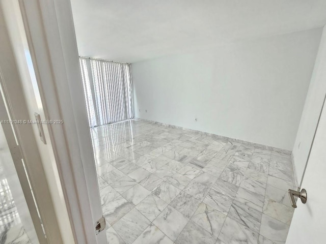 18051 Biscayne Blvd Unit 1704, Aventura, FL 33160 - spare room with marble finish floor