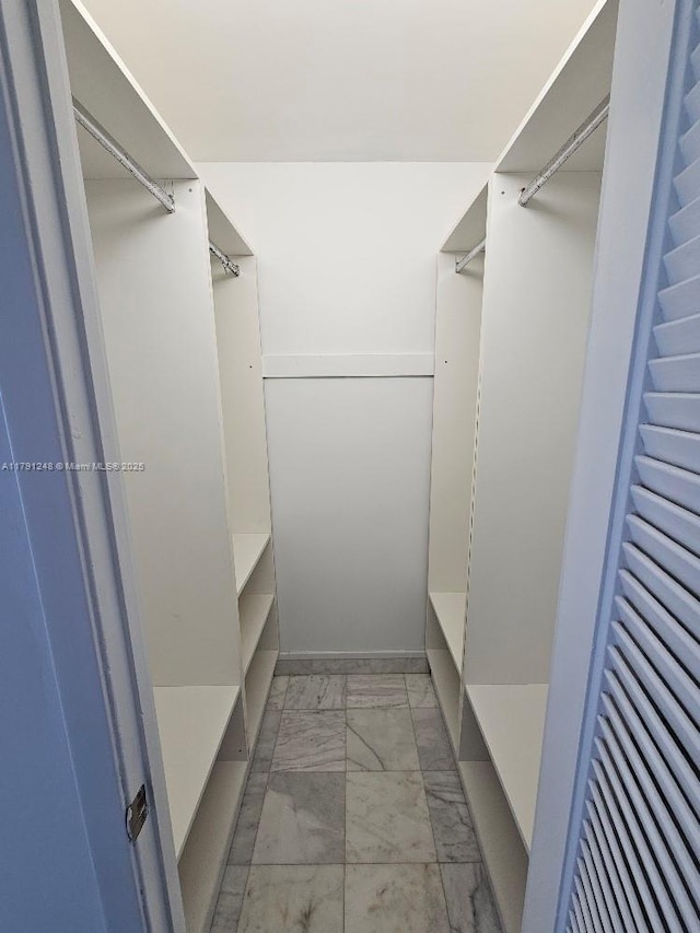 18051 Biscayne Blvd Unit 1704, Aventura, FL 33160 - spacious closet with marble finish floor