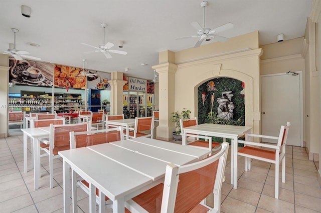 18051 Biscayne Blvd Unit 1704, Aventura, FL 33160 - dining room with ornate columns, a ceiling fan, and light tile patterned flooring