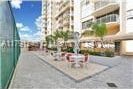 18051 Biscayne Blvd Unit 1704, Aventura, FL 33160 - view of home's community with a patio
