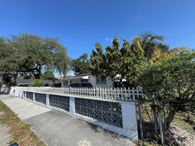1855 NW 93rd St, Miami, FL 33147 - view of front of home with a fenced front yard
