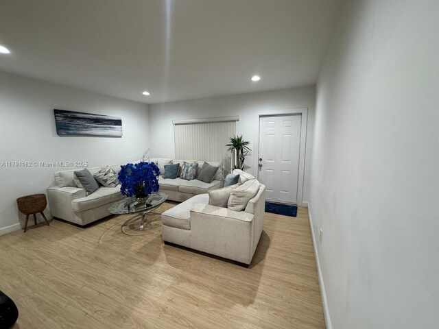 1855 NW 93rd St, Miami, FL 33147 - living area featuring recessed lighting, light wood-style flooring, and baseboards