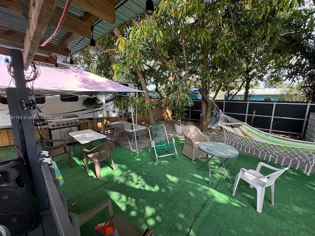 1855 NW 93rd St, Miami, FL 33147 - view of patio / terrace featuring a fenced backyard and grilling area