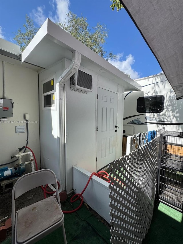 1855 NW 93rd St, Miami, FL 33147 - exterior space with a wall mounted AC