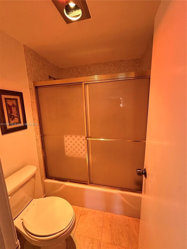 300 Bayview Dr Unit 315, Sunny Isles Beach, FL 33160 - bathroom with combined bath / shower with glass door and toilet