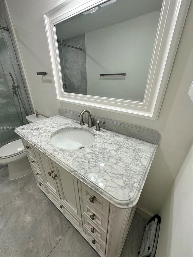 300 Bayview Dr Unit 315, Sunny Isles Beach, FL 33160 - full bath with vanity, a shower, and toilet