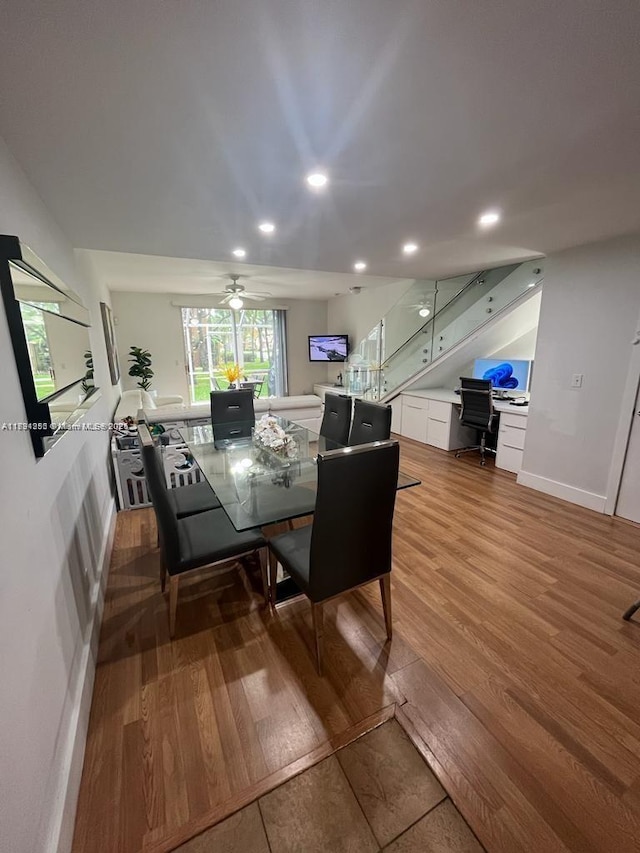 dining room featuring recessed lighting, ceiling fan, baseboards, and light wood-type flooring