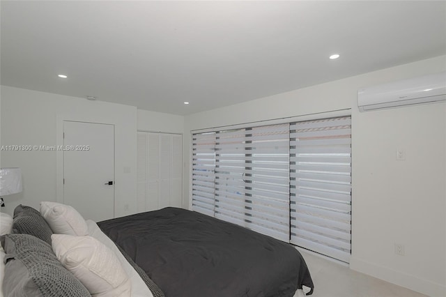 bedroom with recessed lighting and a wall unit AC