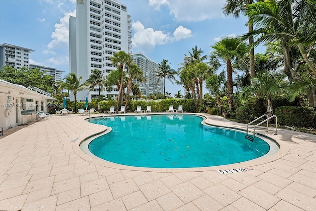 pool featuring a patio area