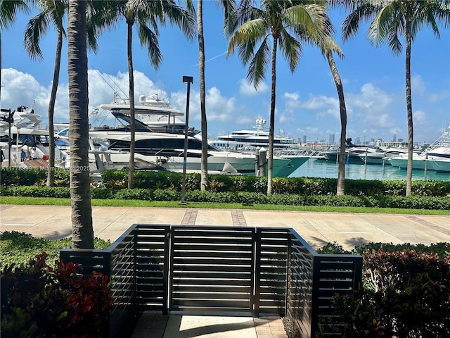 surrounding community with a water view