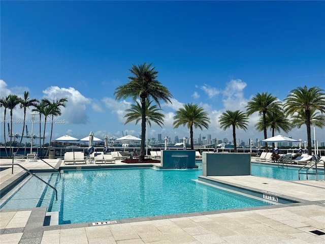 pool featuring a patio area
