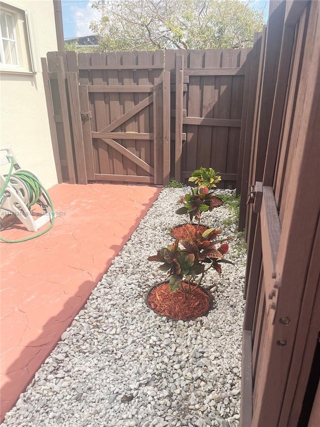 17970 SW 152nd Ave, Miami, FL 33187 - view of yard with a gate and fence