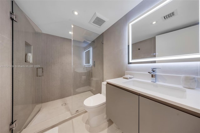 9801 Collins Ave Unit 17R, Bal Harbour, FL 33154 - full bath with vanity, a stall shower, toilet, and visible vents