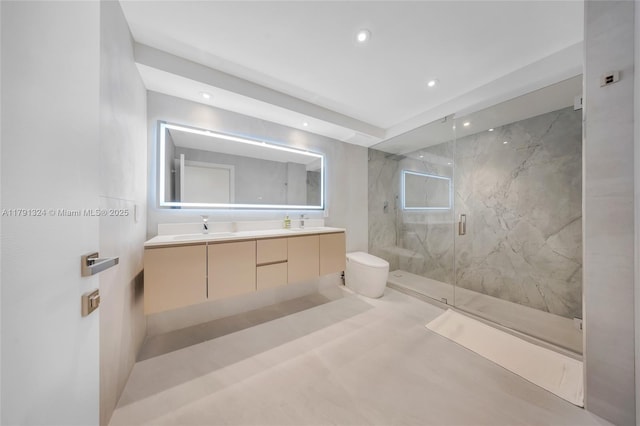9801 Collins Ave Unit 17R, Bal Harbour, FL 33154 - bathroom with double vanity, a sink, toilet, a marble finish shower, and recessed lighting