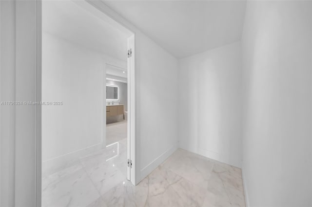 9801 Collins Ave Unit 17R, Bal Harbour, FL 33154 - bathroom with baseboards and marble finish floor