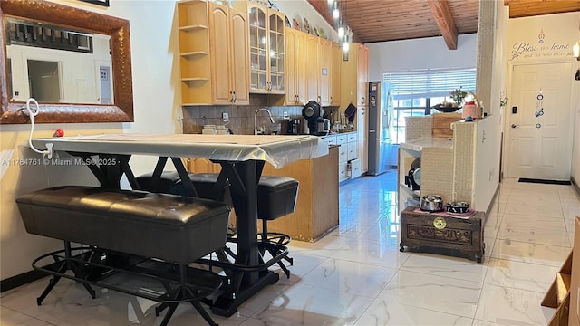 kitchen with open shelves, marble finish floor, wood ceiling, tasteful backsplash, and glass insert cabinets