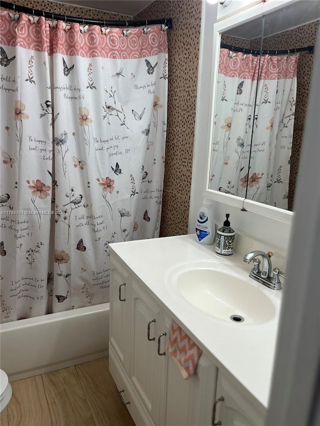 full bath with vanity and shower / bath combo with shower curtain