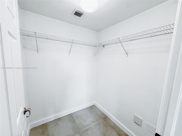 walk in closet featuring visible vents