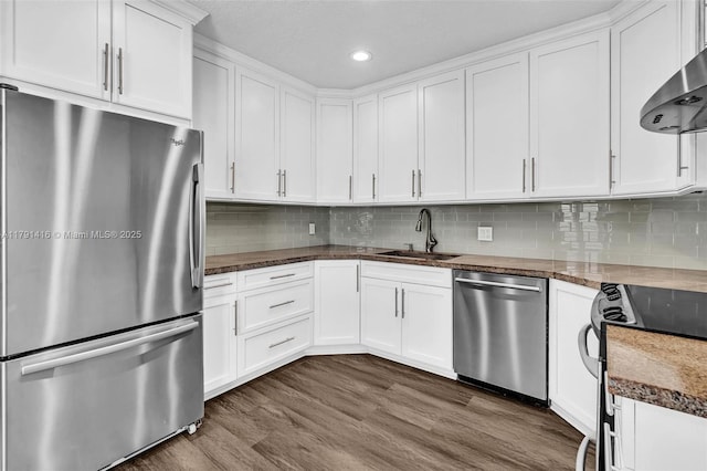 23140 Island Vw Unit 3, Boca Raton, FL 33433 - kitchen with a sink, white cabinetry, decorative backsplash, and stainless steel appliances