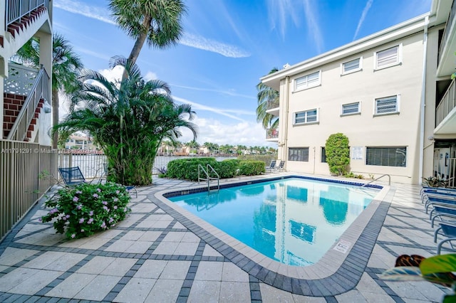 2600 S Ocean Dr Unit S314, Hollywood, FL 33019 - view of swimming pool with fence, a fenced in pool, and a patio area