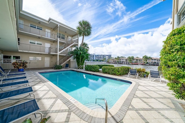 2600 S Ocean Dr Unit S314, Hollywood, FL 33019 - community pool with fence, stairs, and a patio area