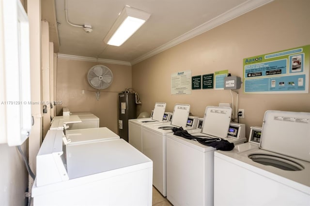 2600 S Ocean Dr Unit S314, Hollywood, FL 33019 - common laundry area with water heater, washer and clothes dryer, and crown molding