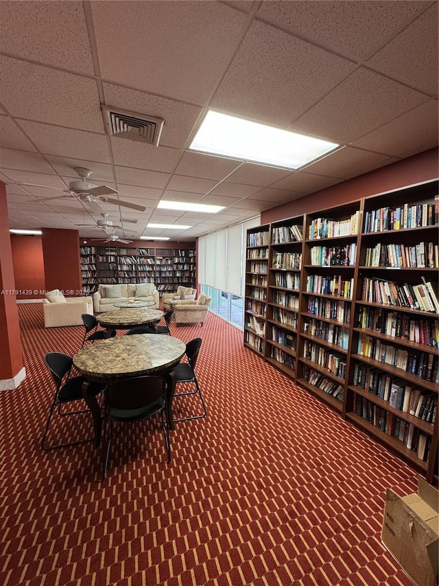 2150 Sans Souci Blvd Unit B611, North Miami, FL 33180 - misc room with a drop ceiling, a ceiling fan, and wall of books