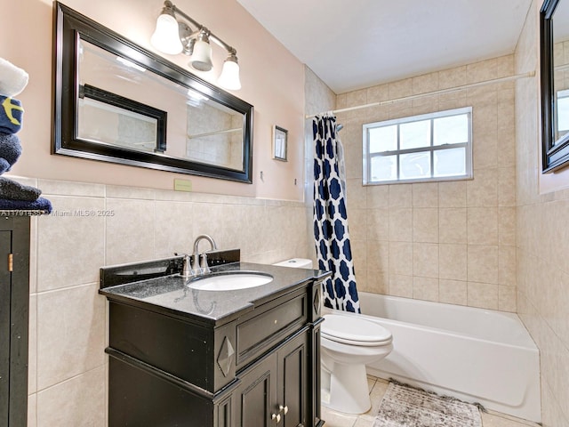 3242 Arthur St, Hollywood, FL 33021 - bathroom featuring tile walls, tile patterned flooring, shower / tub combo, vanity, and toilet