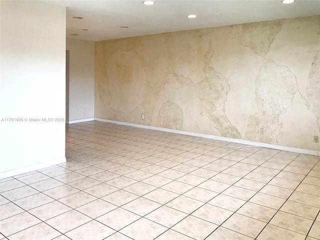 3242 Arthur St, Hollywood, FL 33021 - unfurnished room featuring recessed lighting, baseboards, and stone wall