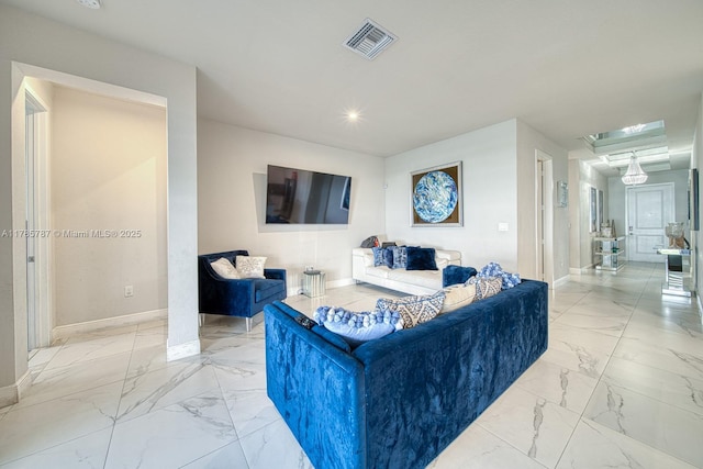 living room featuring baseboards, visible vents, recessed lighting, and marble finish floor