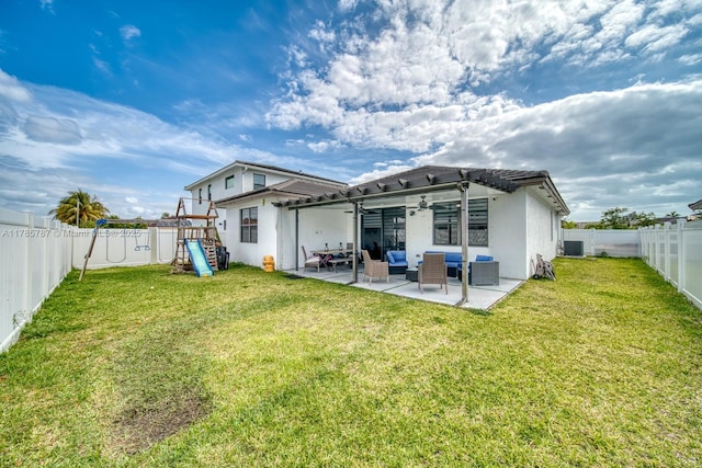 back of house with an outdoor hangout area, stucco siding, a fenced backyard, a playground, and a patio