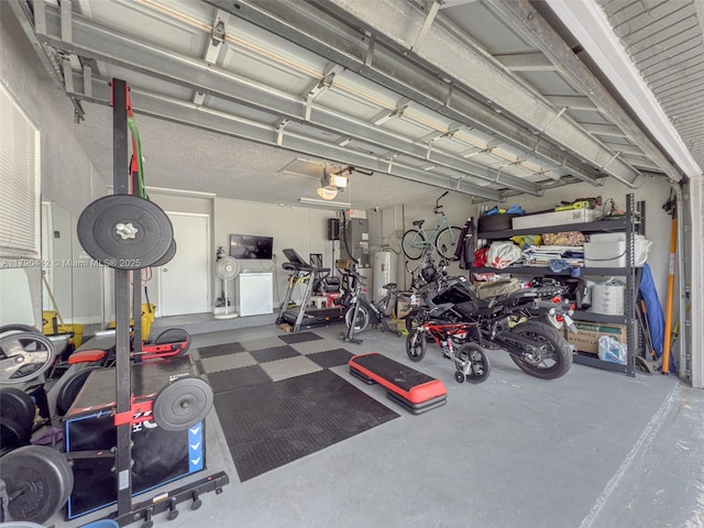 garage featuring washing machine and dryer and a garage door opener