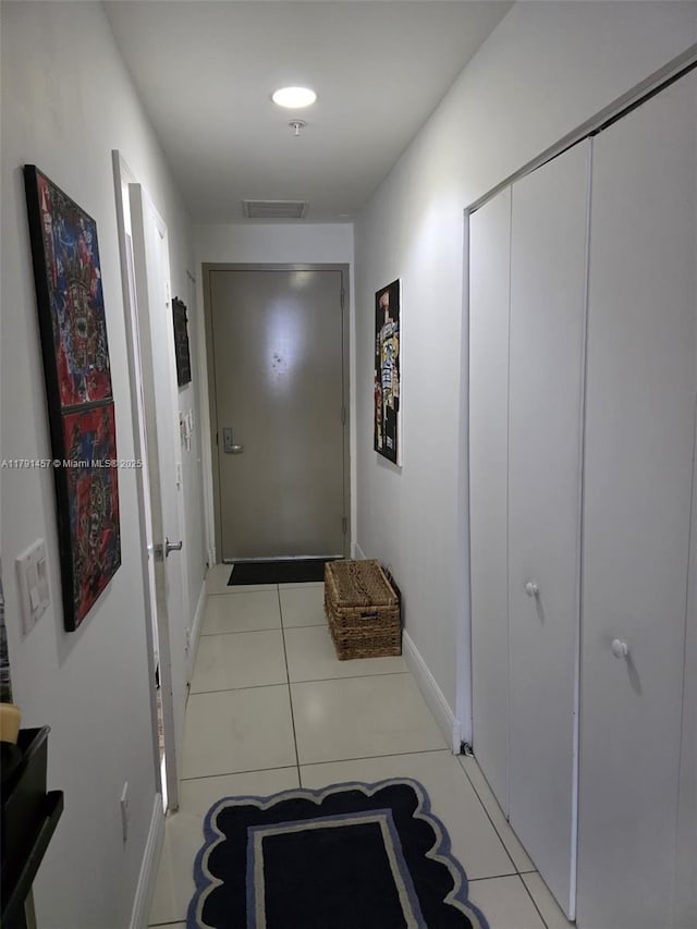 1750 N Bayshore Dr Unit 1120, Miami, FL 33132 - hallway with light tile patterned floors, visible vents, and baseboards