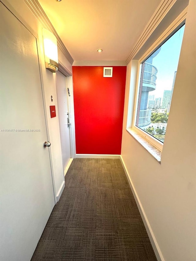 1627 Brickell Ave Unit 2005, Miami, FL 33129 - corridor with crown molding, carpet floors, recessed lighting, baseboards, and visible vents