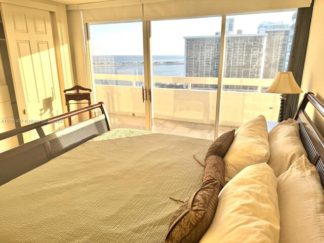 1627 Brickell Ave Unit 2005, Miami, FL 33129 - bedroom with a water view
