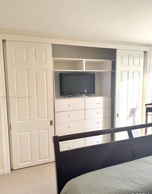 1627 Brickell Ave Unit 2005, Miami, FL 33129 - bedroom featuring light colored carpet and a closet