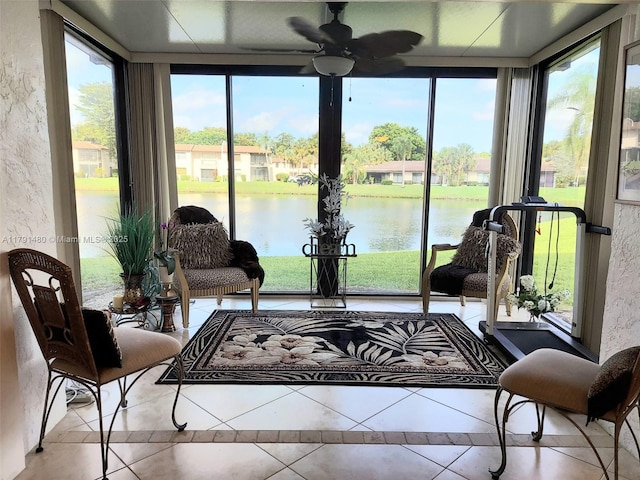 21338 Juego Cir Unit 11C, Boca Raton, FL 33433 - sunroom / solarium featuring tile patterned flooring and a water view