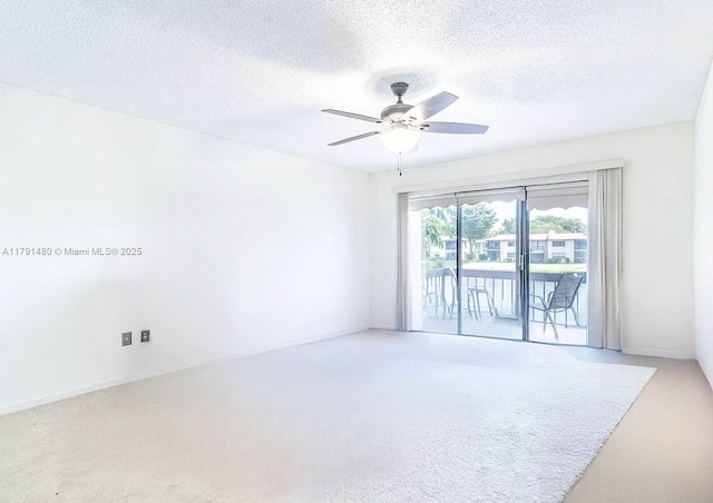 21338 Juego Cir Unit 11C, Boca Raton, FL 33433 - carpeted spare room featuring a ceiling fan and a textured ceiling