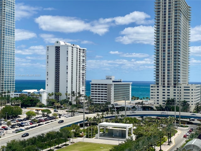 property's view of city featuring a water view