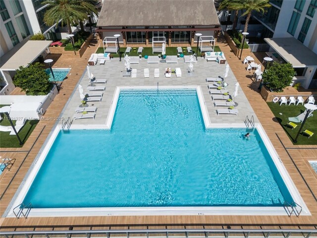 community pool with a patio