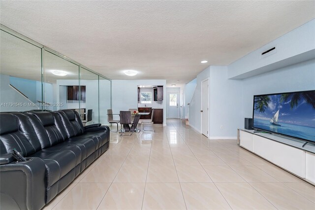 dining area featuring baseboards, light tile patterned flooring, and stairway