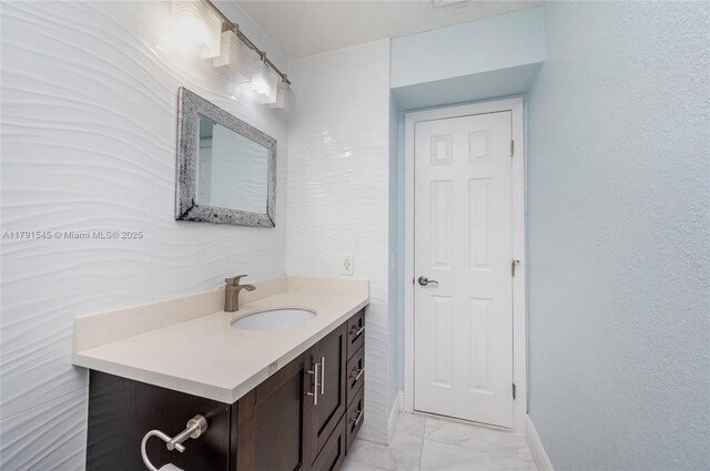 bedroom featuring baseboards, ceiling fan, and light tile patterned floors