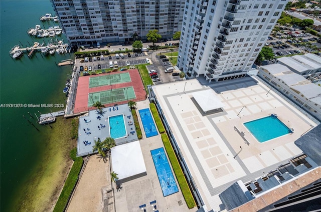 birds eye view of property featuring a water view
