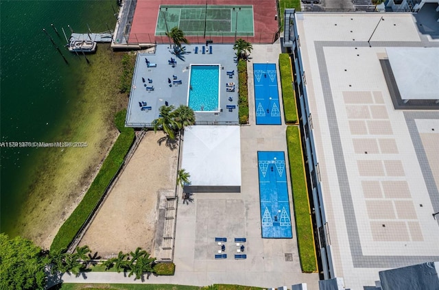 drone / aerial view with a water view