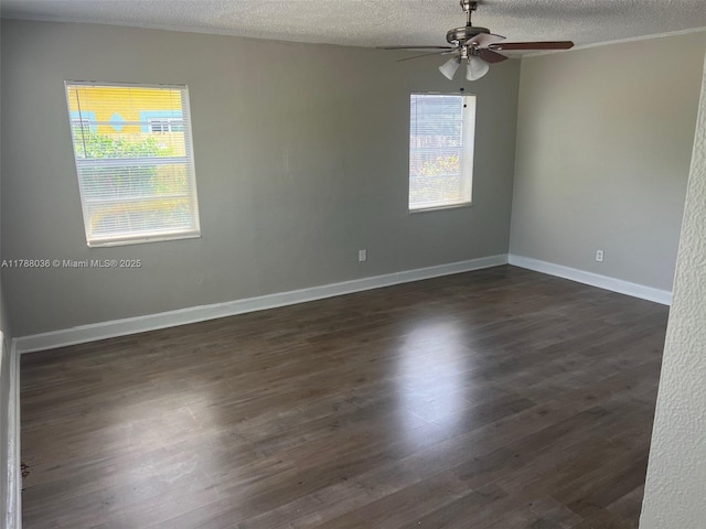 4410 NW 30th Ct, Lauderdale Lakes, FL 33313 - unfurnished room with baseboards, ceiling fan, a textured ceiling, and dark wood-style flooring