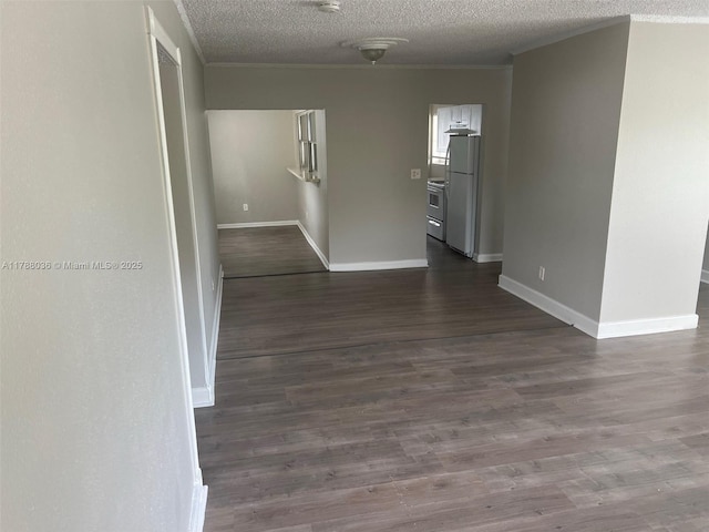 4410 NW 30th Ct, Lauderdale Lakes, FL 33313 - hallway with crown molding, a textured ceiling, dark wood-type flooring, and baseboards