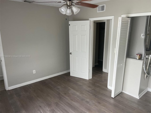 4410 NW 30th Ct, Lauderdale Lakes, FL 33313 - unfurnished bedroom featuring baseboards, visible vents, ceiling fan, and dark wood-style floors