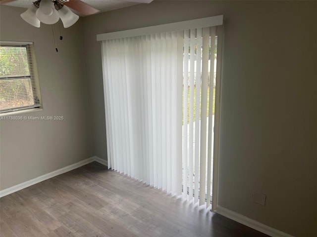 4410 NW 30th Ct, Lauderdale Lakes, FL 33313 - spare room featuring wood finished floors, ceiling fan, and baseboards